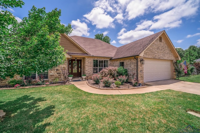 2106 Katie Lee Ln, Longview, TX 75601 - view of front of property featuring brick siding, an attached garage, driveway, a front lawn, and roof with shingles
