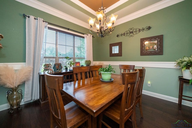 2106 Katie Lee Ln, Longview, TX 75601 - dining area featuring a chandelier, dark wood-style flooring, ornamental molding, and wainscoting