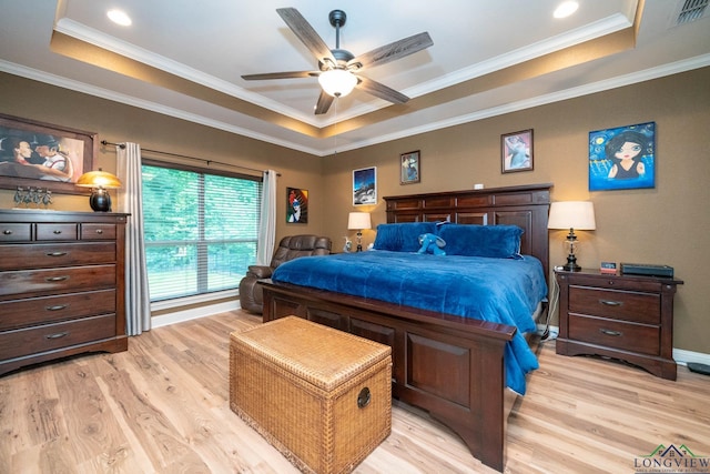 2106 Katie Lee Ln, Longview, TX 75601 - bedroom with a tray ceiling, light wood-style flooring, ornamental molding, and baseboards