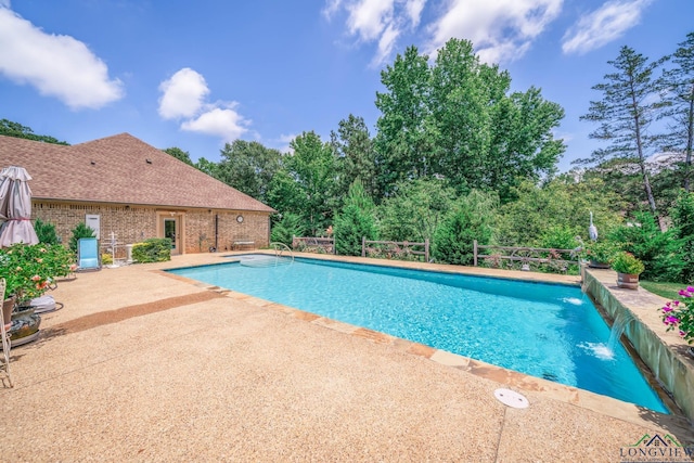 2106 Katie Lee Ln, Longview, TX 75601 - outdoor pool with a patio area