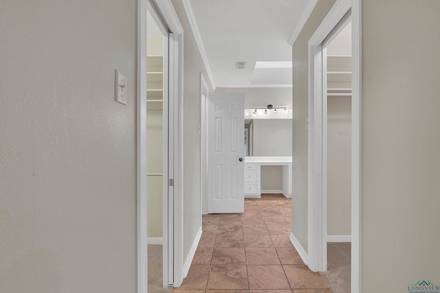 hallway with crown molding