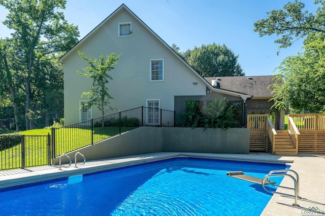 view of pool featuring a deck