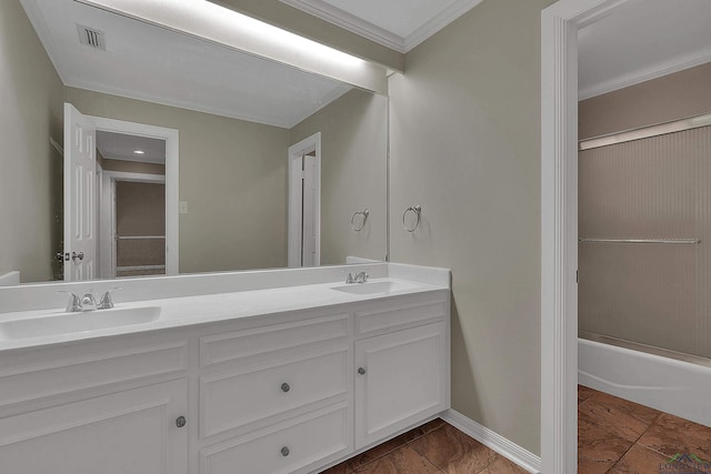 bathroom featuring shower / bath combination with glass door, vanity, tile patterned floors, and ornamental molding