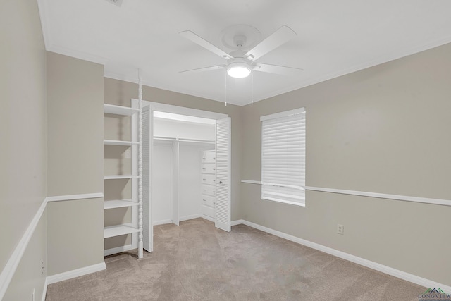 unfurnished bedroom with ceiling fan, a closet, and light carpet