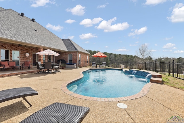 view of swimming pool featuring a fenced in pool, a patio, and fence