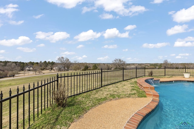 view of swimming pool with a rural view, a yard, a fenced in pool, and a fenced backyard