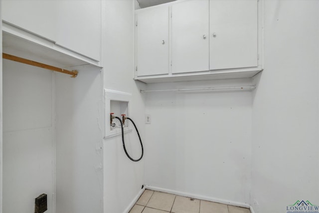 1776 Lazy U Dr, Canton, TX 75103 - washroom with cabinet space, hookup for a washing machine, and light tile patterned flooring