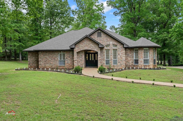 view of front of house with a front lawn