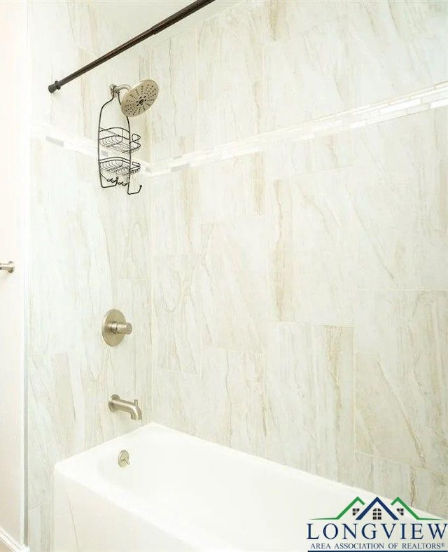 full bath featuring shower / washtub combination