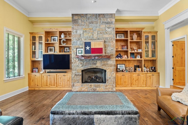 12265 Sable Ln, Whitehouse, TX 75791 - living area with ornamental molding, a stone fireplace, hardwood / wood-style flooring, and baseboards