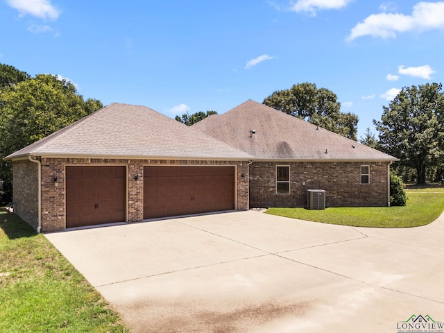 12265 Sable Ln, Whitehouse, TX 75791 - view of front of home with a garage, concrete driveway, a front yard, a shingled roof, and central air condition unit