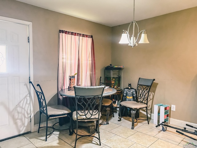 203 Reynolds St, Pittsburg, TX 75686 - dining area with a chandelier, plenty of natural light, and tile patterned flooring