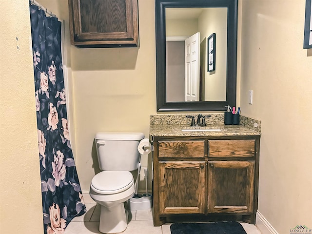 203 Reynolds St, Pittsburg, TX 75686 - bathroom with tile patterned flooring, vanity, and a shower with curtain