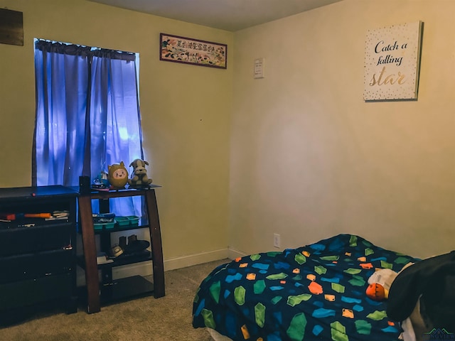 203 Reynolds St, Pittsburg, TX 75686 - bedroom with carpet and baseboards