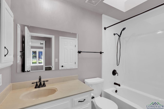 full bathroom with shower / bathing tub combination, vanity, and toilet