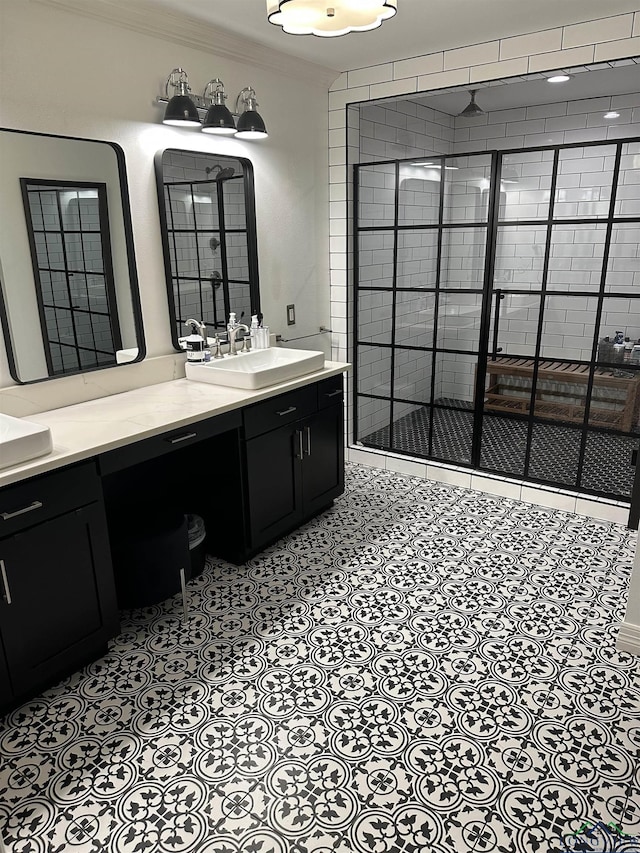 bathroom featuring vanity, an enclosed shower, and crown molding