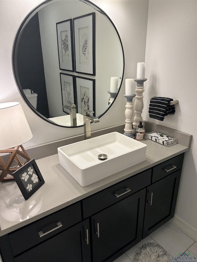 bathroom featuring vanity and tile patterned floors