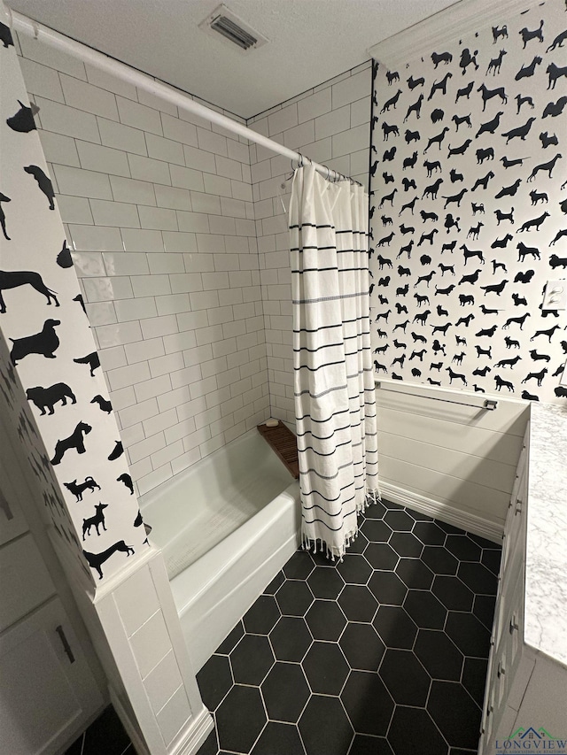 bathroom with shower / bath combination with curtain and tile patterned floors