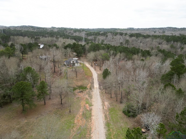 aerial view with a rural view and a wooded view