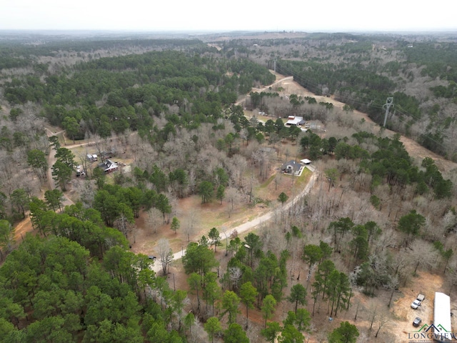 drone / aerial view with a view of trees