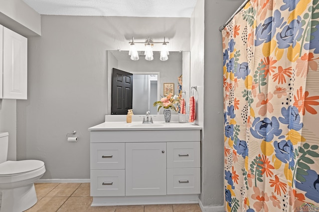 full bathroom with baseboards, a shower with shower curtain, toilet, tile patterned flooring, and vanity