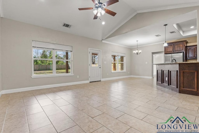 unfurnished living room featuring visible vents, ceiling fan with notable chandelier, crown molding, baseboards, and vaulted ceiling