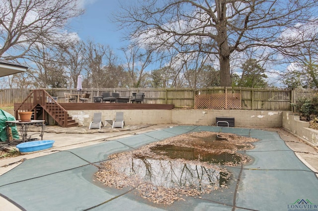 exterior space featuring a wooden deck