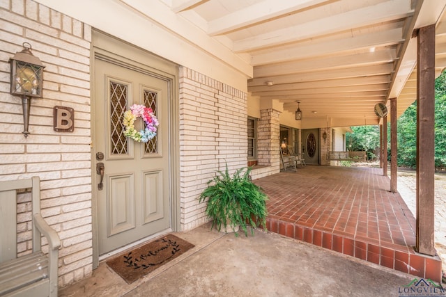 entrance to property with covered porch