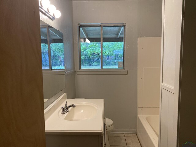 full bath with vanity, tile patterned flooring, and toilet