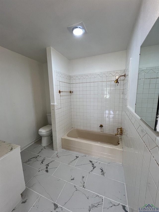 bathroom with toilet and shower / washtub combination