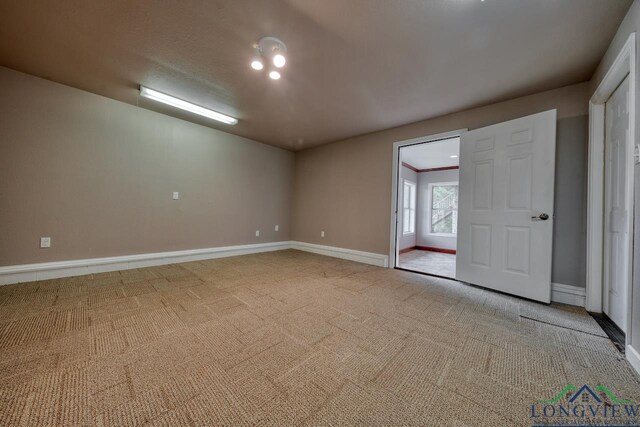 521 Hideaway Ln, Central, Hideaway, TX 75771 - carpeted spare room featuring baseboards