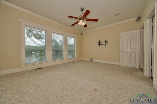 521 Hideaway Ln, Central, Hideaway, TX 75771 - unfurnished room featuring carpet floors, baseboards, ornamental molding, and a ceiling fan