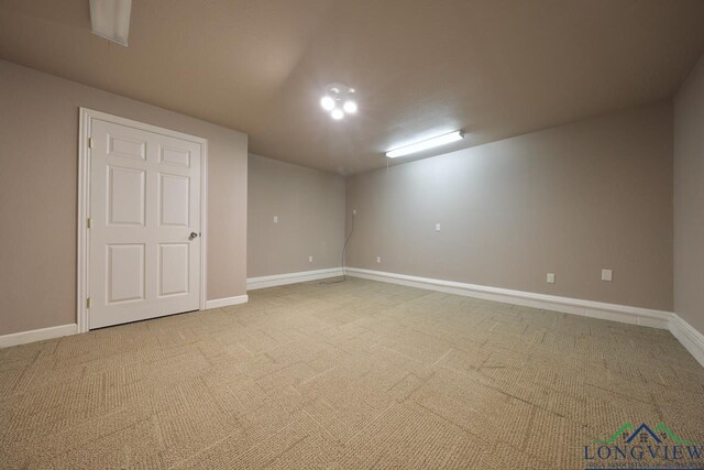 521 Hideaway Ln, Central, Hideaway, TX 75771 - spare room with light colored carpet and baseboards