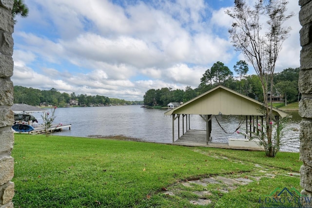 521 Hideaway Ln, Central, Hideaway, TX 75771 - view of dock with a yard, a water view, and boat lift