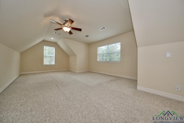521 Hideaway Ln, Central, Hideaway, TX 75771 - bonus room featuring visible vents, vaulted ceiling, light carpet, and baseboards