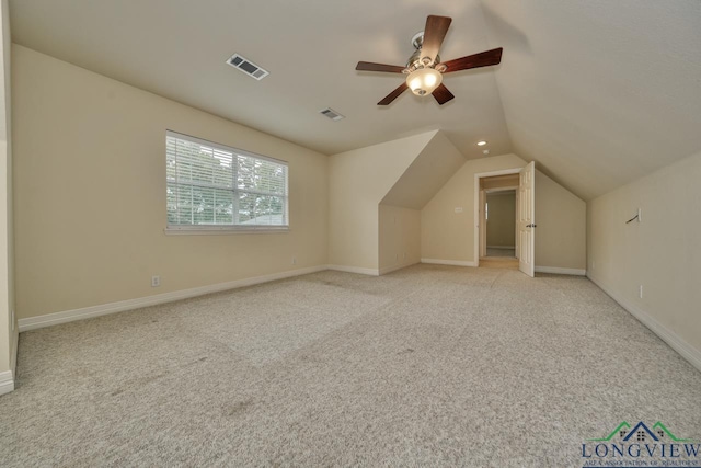 521 Hideaway Ln, Central, Hideaway, TX 75771 - additional living space featuring lofted ceiling, light carpet, visible vents, and baseboards