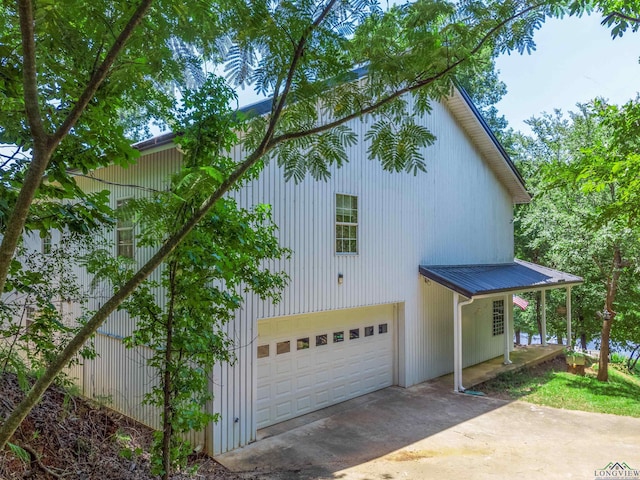 view of property exterior featuring a garage