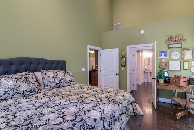 bedroom featuring a high ceiling