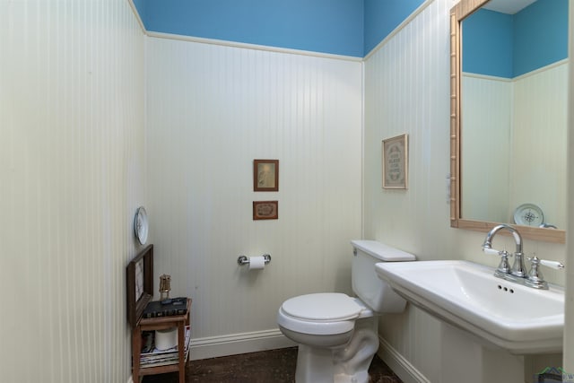 bathroom featuring sink and toilet