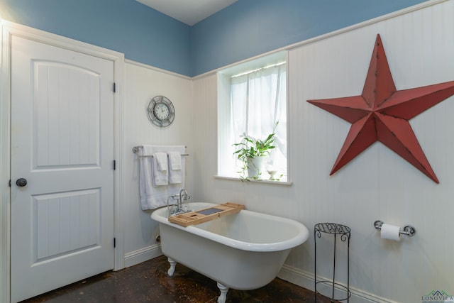 bathroom with a tub