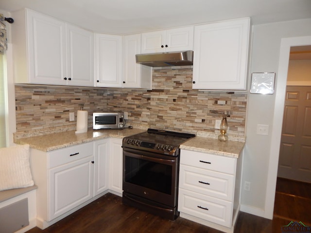 kitchen with light stone countertops, white cabinetry, backsplash, and black range with electric cooktop