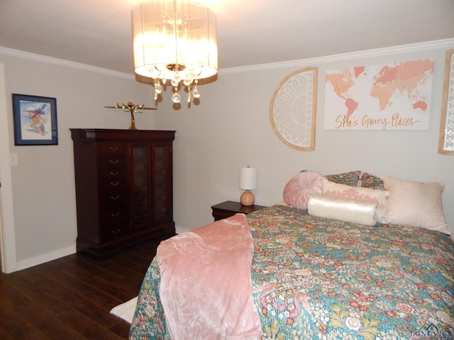 bedroom featuring a chandelier, dark hardwood / wood-style floors, and crown molding