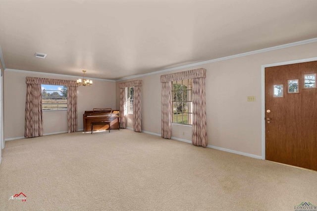 unfurnished living room featuring carpet floors, ornamental molding, and an inviting chandelier