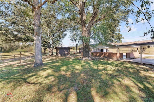 view of yard with a shed