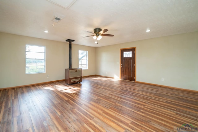 unfurnished room featuring ceiling fan and wood-type flooring