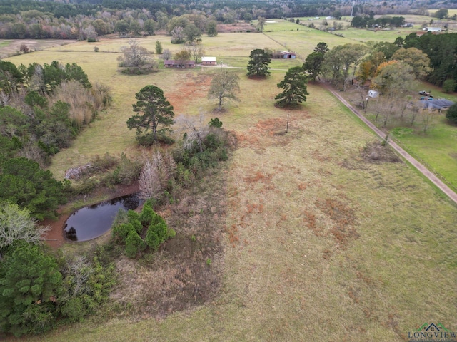 aerial view with a rural view and a water view