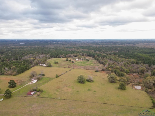 birds eye view of property with a rural view