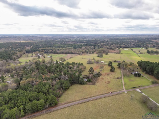 birds eye view of property featuring a rural view