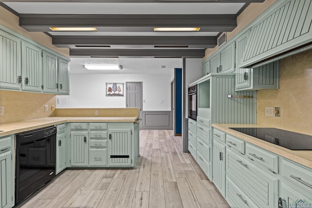5 Amy Scott Ct, Longview, TX 75605 - kitchen with black appliances, a peninsula, green cabinetry, light wood-type flooring, and wainscoting