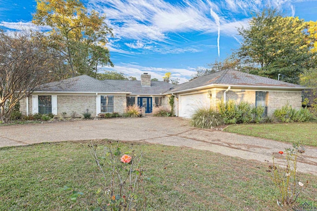 5 Amy Scott Ct, Longview, TX 75605 - ranch-style house with driveway, a chimney, an attached garage, a front lawn, and brick siding